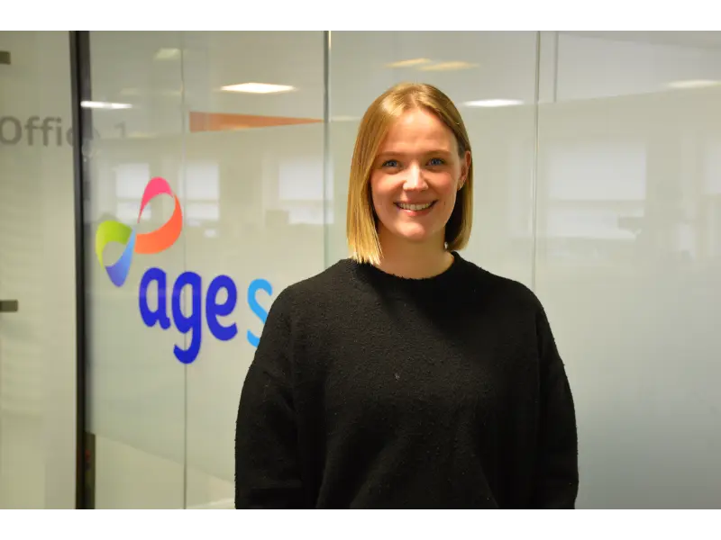 Anna Clements in the Age Scotland office